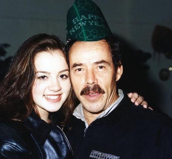 An old image of Rosie Rivera with her father
