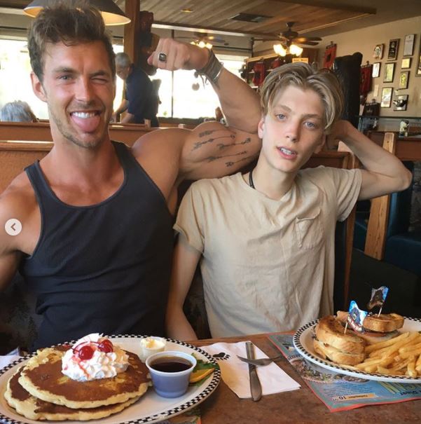 Christian Hogue with his brother