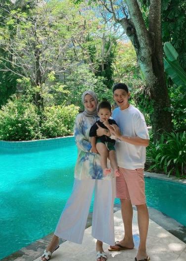 Citra Kirana with her husband and son