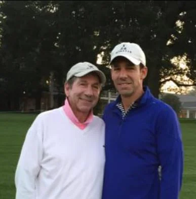 Erik Brooks with his father
