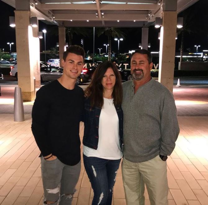 Garrett Miller with his parents