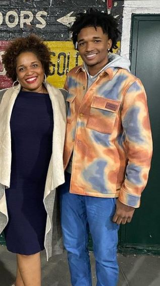 Isaiah Hill with his mother