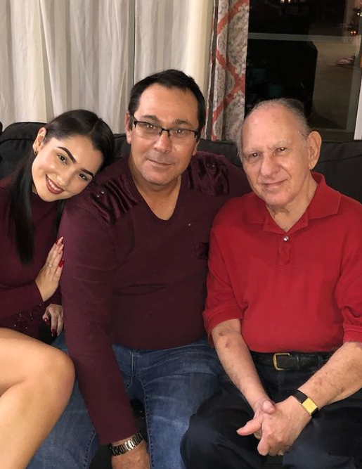 Paloma Silva with her father and grandfather