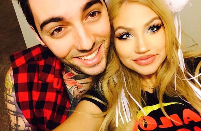 Romeo Lacoste with his girlfriend