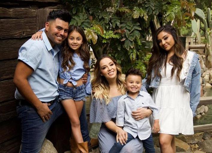 Rosie Rivera with her husband and kids