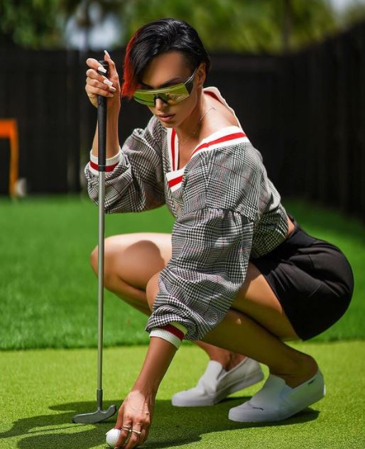 Zahra Elise playing Golf
