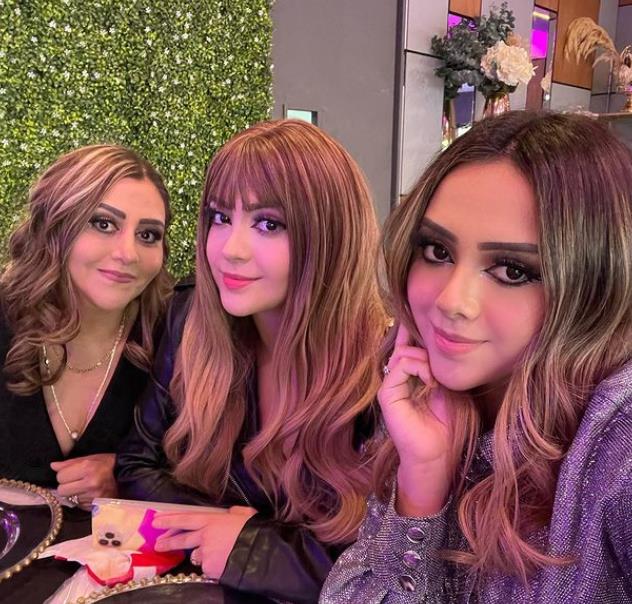 Ama Blitz with mother and sister