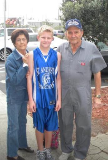 An old image of Parker Boudreaux with his grandparents