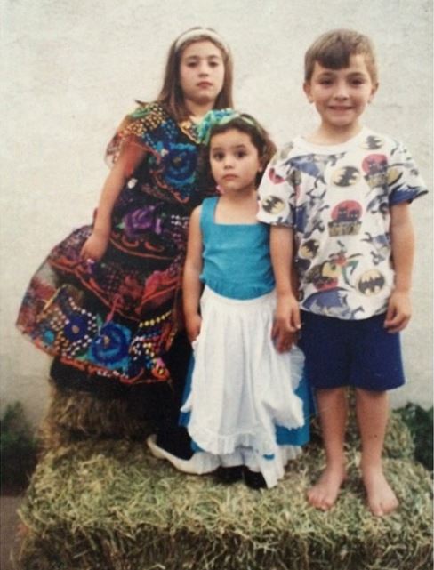 Andrea Londo's childhood image with her siblings