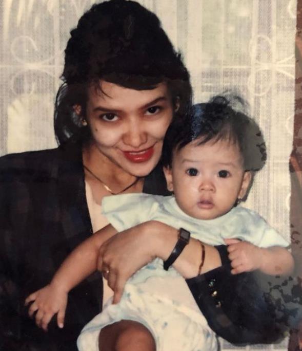 Childhood image of Anya Geraldine with her mother