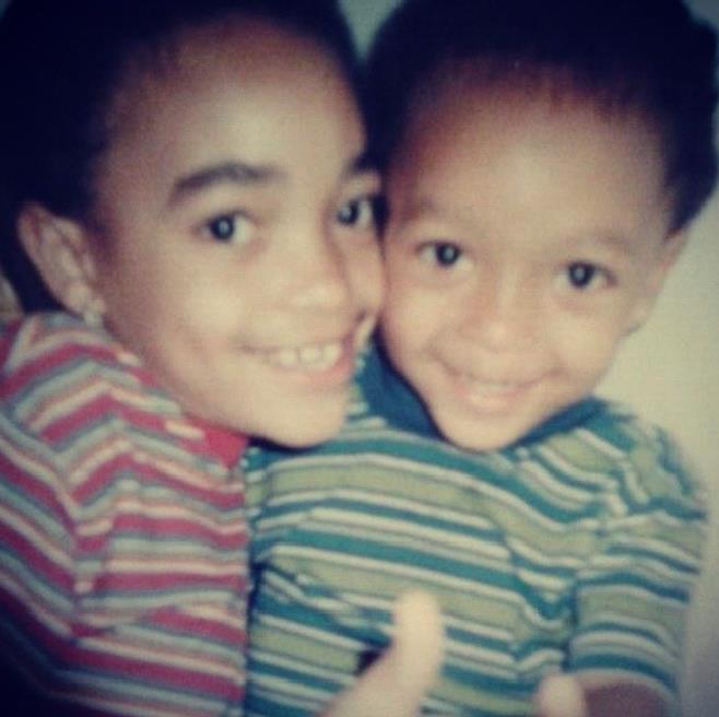Childhood image of Cassie Clare with her brother