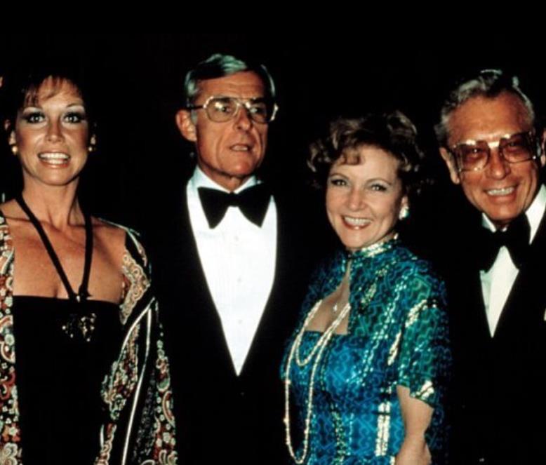 Dick Barker wife with her husband and friends