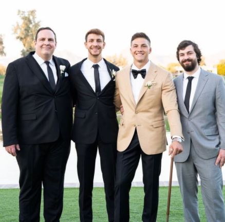 Josh Brueckner with his father and brothers