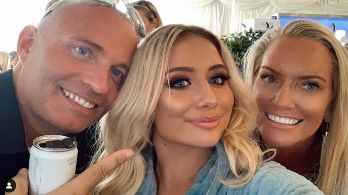 Saffron Barker with her parents