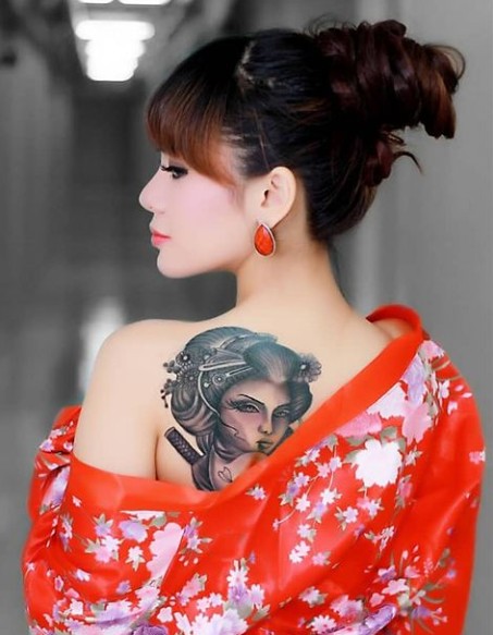 Dinar Candy inked tattoo