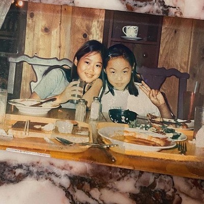 Aimee Song childhood picture with her friend