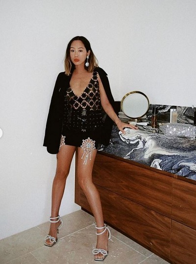 Aimee Song height is 5 feet 6 inches