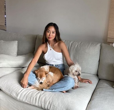 Aimee Song with her pet dogs