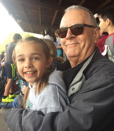 London Robertson with her grandfather