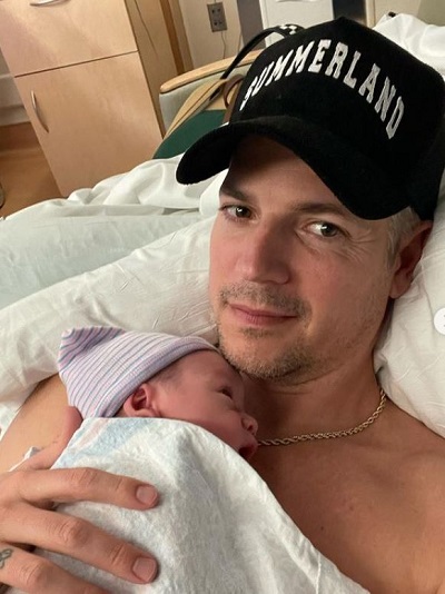 Jason Kennedy with his child Ryver Rhodes Kennedy