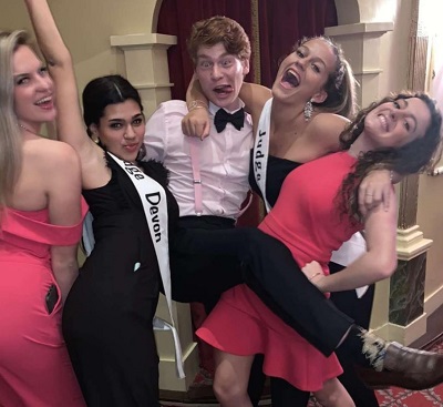Carson Holmes with his female friends