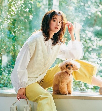 Aya Asahina with her pet dog