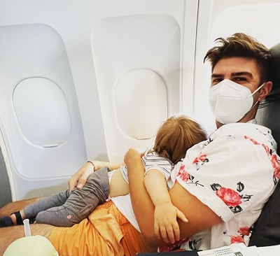 Justin Mikita with his kid Beckett Mercer Ferguson-Mikita