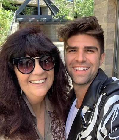 Justin Mikita with his mom