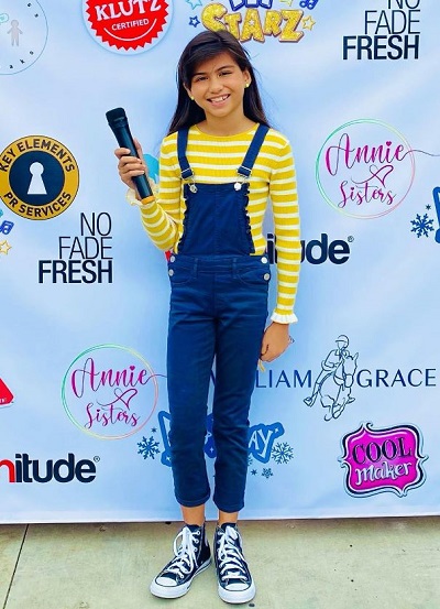 Madison Taylor Baez's height is 4 feet 10 inches