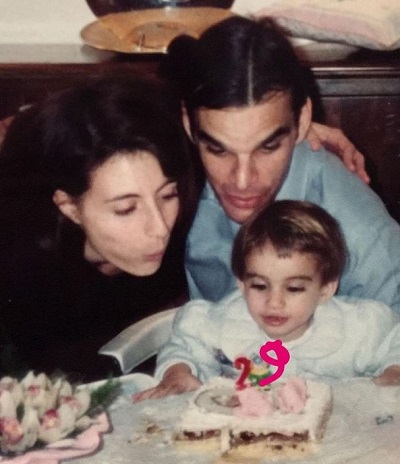 Michela De Rossi childhood picture with her mother and father Alessandro de Rossi