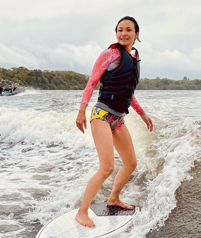 Glenda Chong loves to go surfing