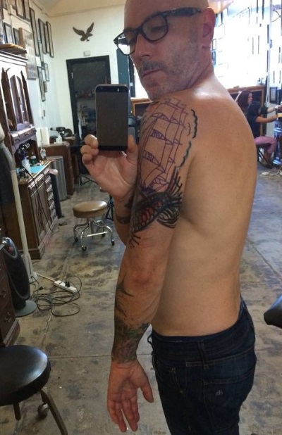 Teddy Landau has tattoos on his left hand