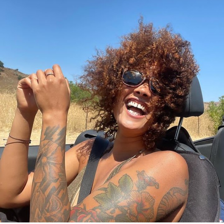 Elyse Cizek inked tattos on her arm