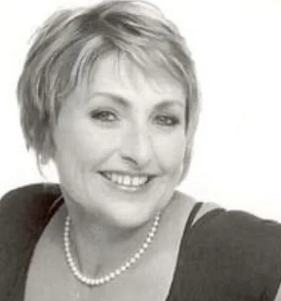 Louise Andree Saulnier holds the nationality of Canadian