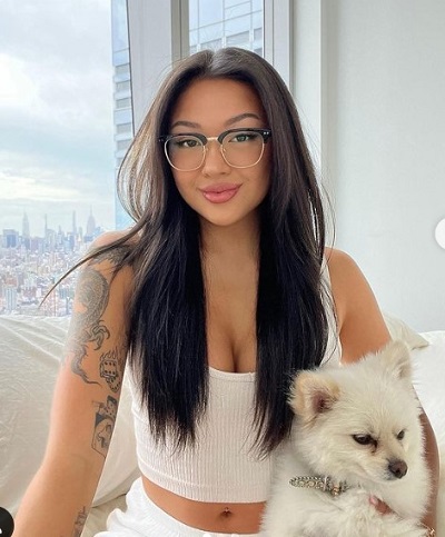 Mai Pham with her pet dog