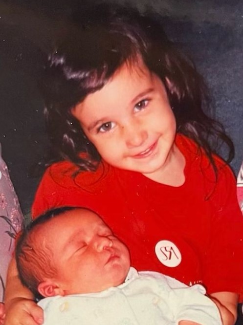 An old image of Maria Amato with her brother