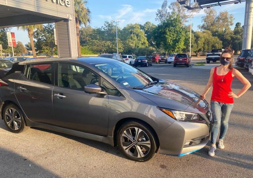 Millie with her car