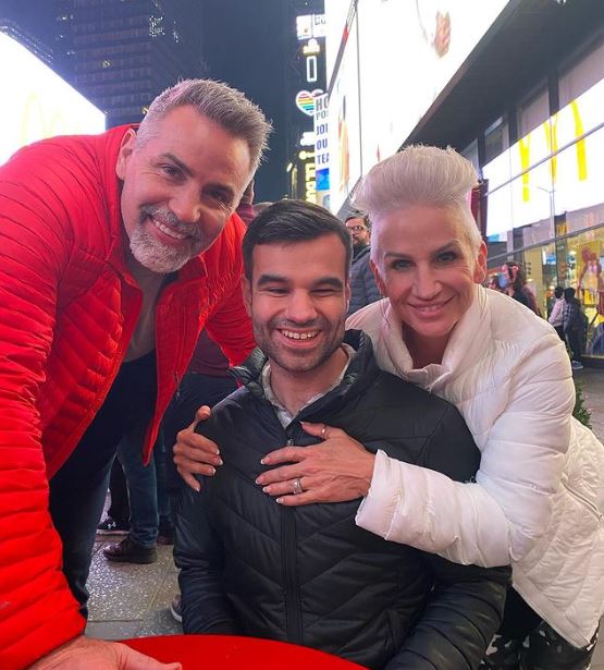 Zachary with his parents Brenda Warner and Kurt Warner