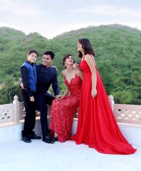 Alesia with her husband and kids