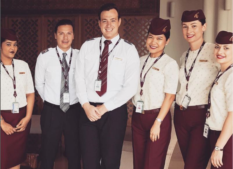 An old image of Kyle with his cabin crew members