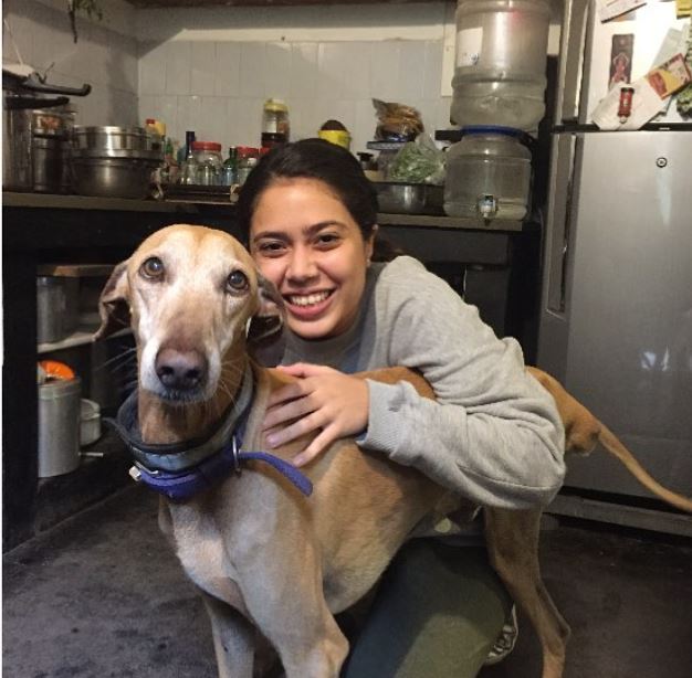 Muskkaan with her dog
