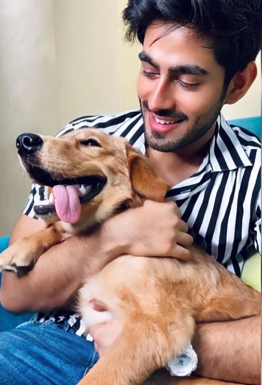 Rishabh with his dog