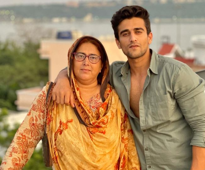 Zayn Khan with his mother