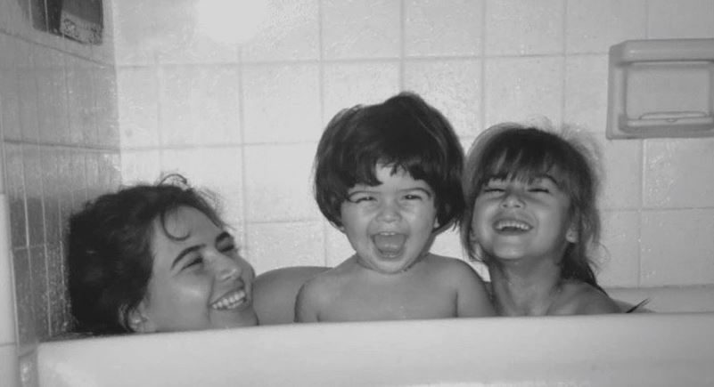 A childhood image of Lisette Olivera with her mom and sister