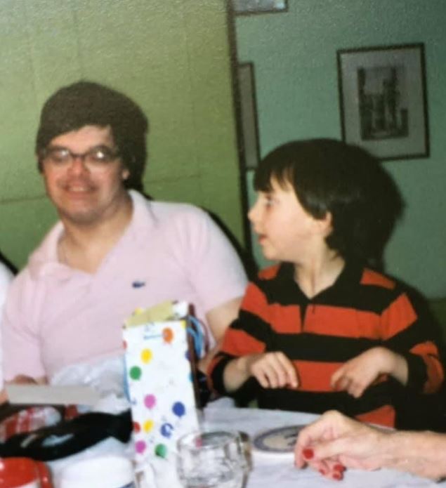 A childhood image of Marti with their uncle