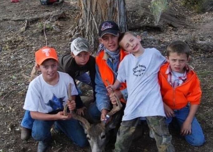 A childhood image of Stetson with his father and siblings