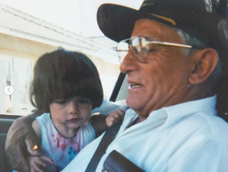 An old image of Lisette Olivera with her grandfather