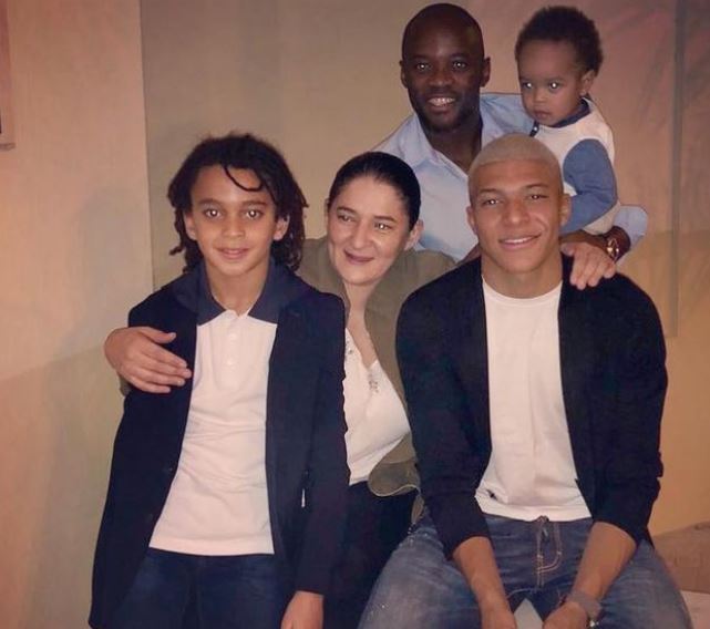 An old image of Wilfried with his wife Fazya Lamari and sons