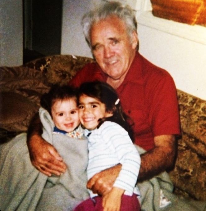 Childhood image of Renee with her dad and sister Lauren Satterthwaite