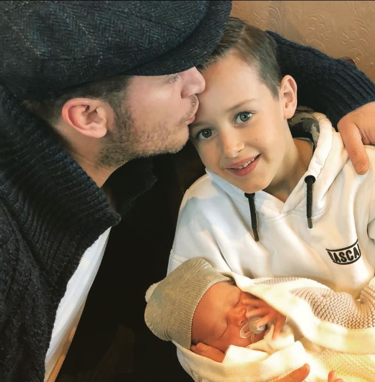 Gary Lucy with his sons Elvis and Theodore